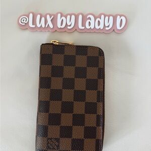 Louis Vuitton Brown Damier Ebene Wallet
Never Used